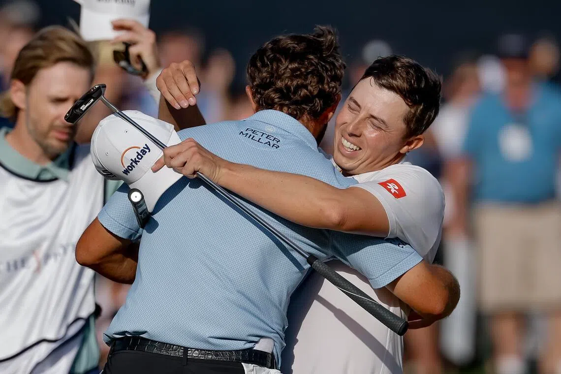 Who's the champion? Matt Fitzpatrick, right, might have finished second at the Players Championship, but his response to winner Cameron Young is a classy grin. 
