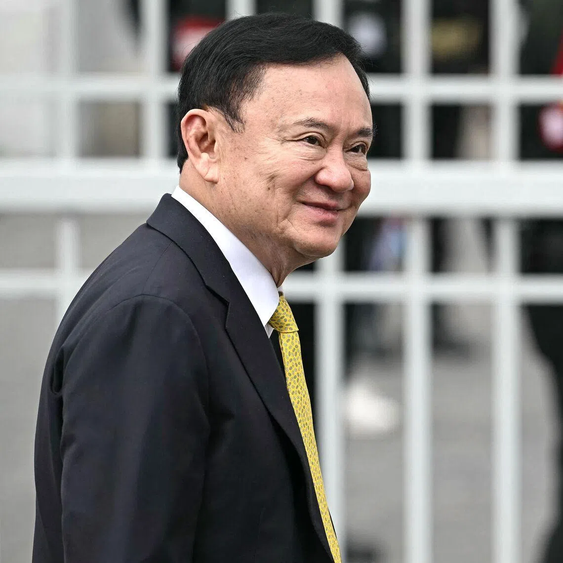 Former Thai premier Thaksin Shinawatra is being paroled after serving eight months in prison for corruption.