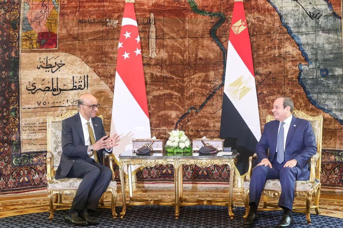 Singapore President Tharman Shanmugaratnam (left) with Egyptian counterpart Abdel Fattah al-Sisi at the official welcome ceremony in Cairo on Sept 20.
