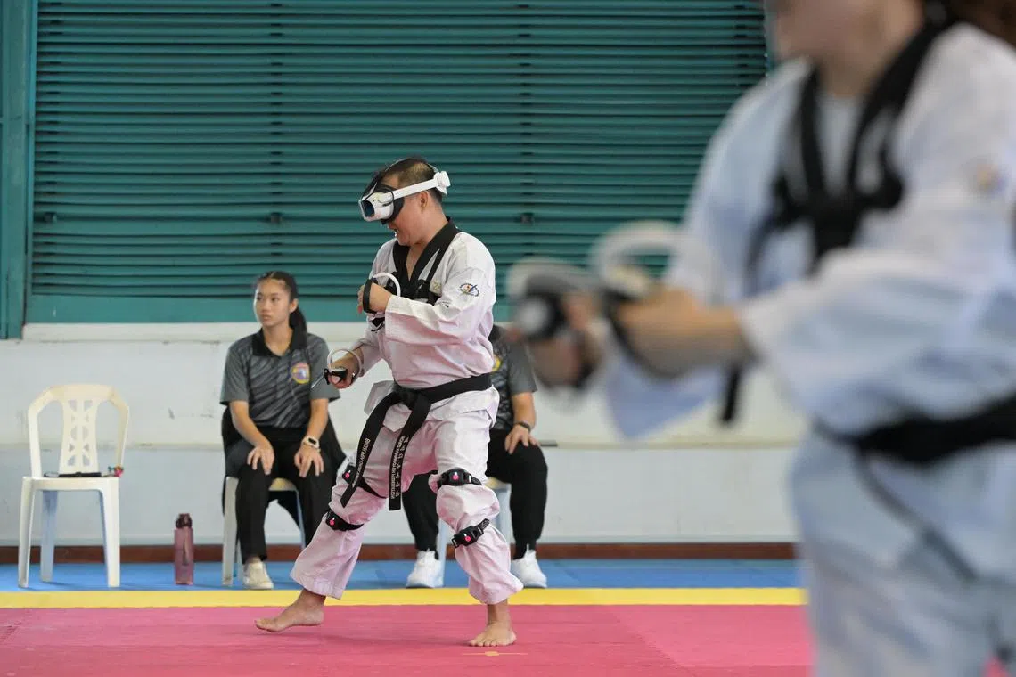 Winner of the Mixed Masters category at the inaugural Singapore Open Virtual Taekwondo Championships, Brian Peh during his match.