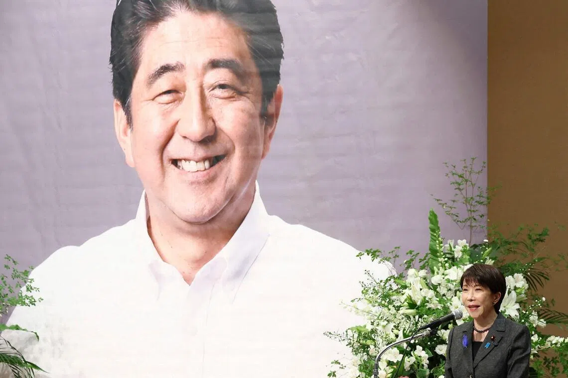 Japan’s leader invokes her hero, Shinzo Abe, to drive nationalist agenda