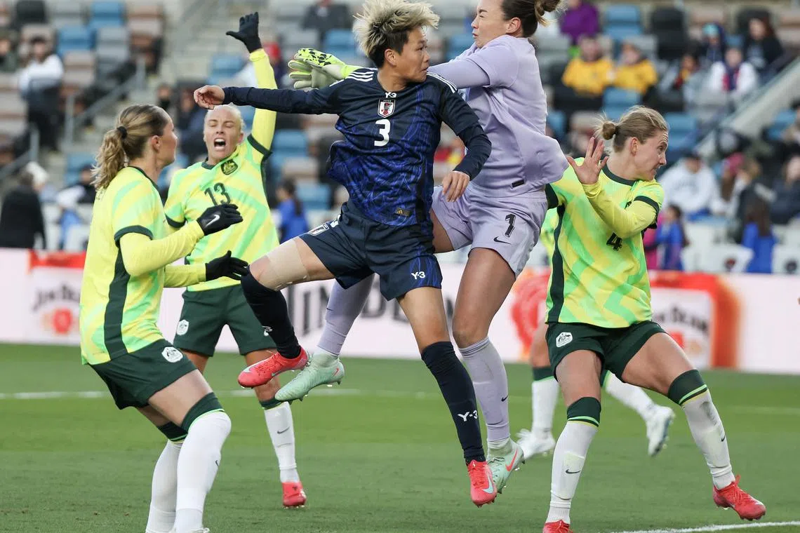 Feb 20, 2025; Houston, Texas, [USA];  Japan defender Moeka Minami (3) reacts to scoring against Australia goalkeeper Mackenzie Arnold (1) in the second half at Shell Energy Stadium. Mandatory Credit: Thomas Shea-Imagn Images