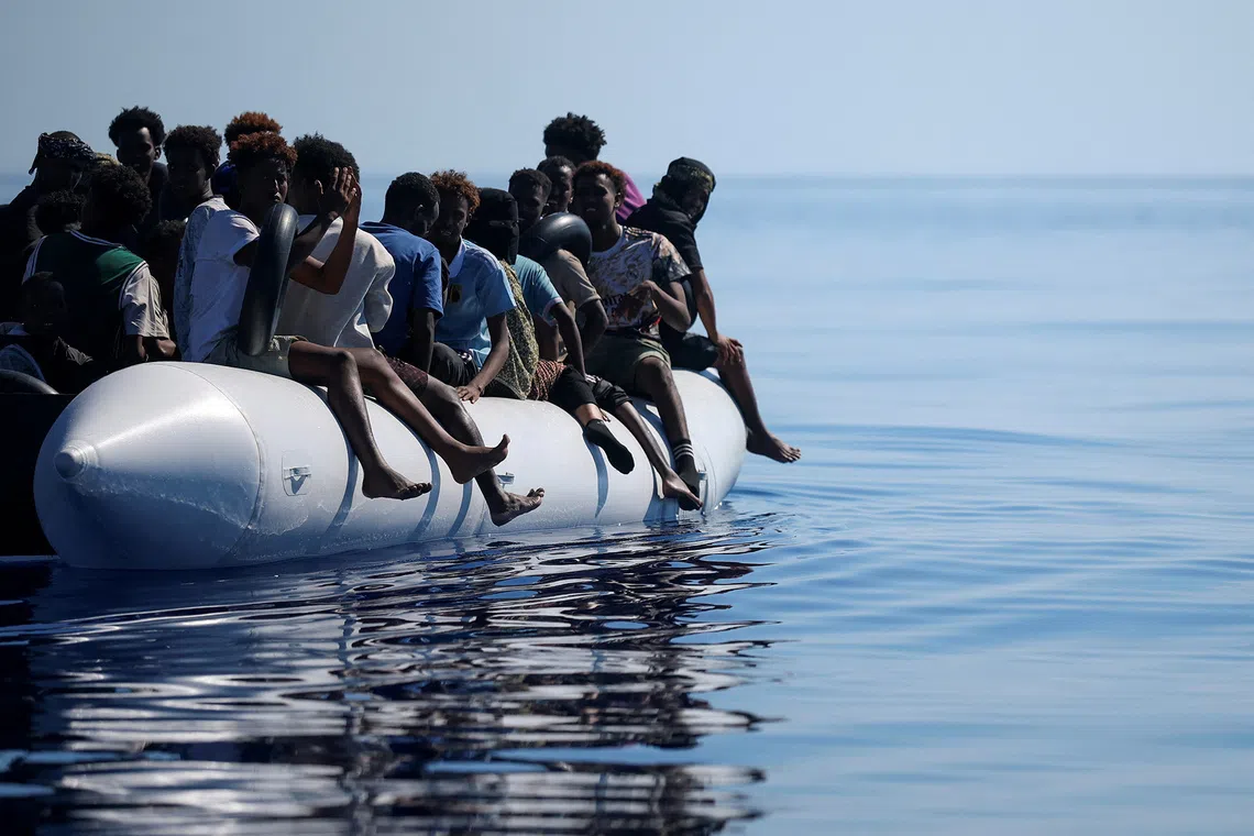 Migrants wait aboard an overcrowded inflatable boat during a rescue operation by the crew of migrant search and rescue ship Ocean Viking, operated by SOS Mediterranee, in the Maltese search and rescue (SAR) zone in the central Mediterranean, September 8, 2026. REUTERS/Stephane Mahe