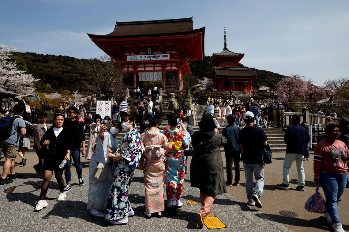 A crowd of tourists are seen at Kiyomizu-dera temple in Kyoto, western Japan.  