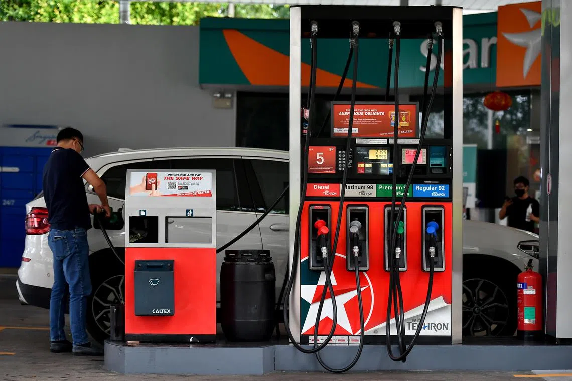 ST20210216-202197893818-Lim Yaohui-pixbudget/

Motorist pumping petrol at Caltex Petrol Service Station at 4870 Beach Road after the Budget was announced on Feb 16, 2021. 

Motorists will have to pay more at the pump from Tuesday (Feb 16), with petrol duties raised for the first time in six years.

Announcing the hike with immediate effect during his Budget speech on Tuesday, Deputy Prime Minister Heng Swee Keat said that motorists will also be given road tax and additional petrol duty rebates to help offset the higher costs.

Petrol duties were last raised in 2015 to encourage less car usage and reduce carbon emissions.

(ST PHOTO: LIM YAOHUI)