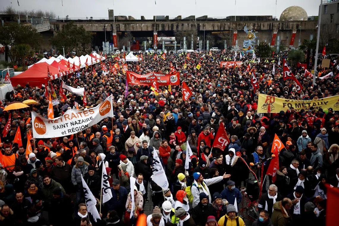 Protesters attend a demonstration against French government's pension reform plan in Saint-Nazaire as part of a day of national strike and protests in France, January 19, 2023.   REUTERS/Stephane Mahe 