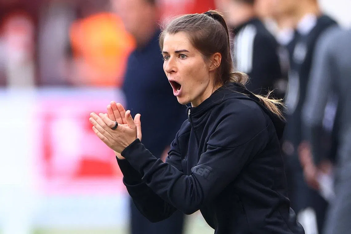 Soccer Football - Bundesliga - 1. FC Union Berlin v VfL Wolfsburg - Stadion An der Alten Forsterei, Berlin, Germany - April 18, 2026  1. FC Union Berlin interim coach Marie-Louise Eta reacts REUTERS/Lisi Niesner