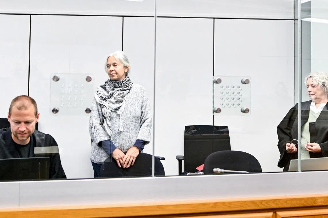 FILE PHOTO: Daniela Klette, former member of German far-left militant group The Red Army Faction (RAF), accompanied by her lawyers Lukas Theune and Undine Weyers, attends another day of her trial at the Celle higher regional court, in Celle, Germany, May 6, 2025. Fabian Bimmer/Pool via REUTERS/File Photo