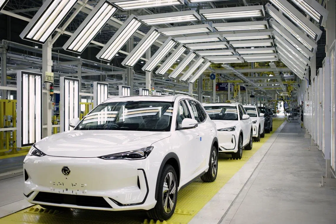 Proton Holdings Bhd. e.MAS 7 electric vehicles at the company's plant in Tanjung Malim, Perak, Malaysia, on Thursday, Sept. 4, 2025. Proton, the Malaysian carmaker backed by China’s Geely Automobile Holdings Ltd., launched its electric vehicle production plant on Thursday, marking the country’s first foray into EV manufacturing. Photographer: Samsul Said/Bloomberg