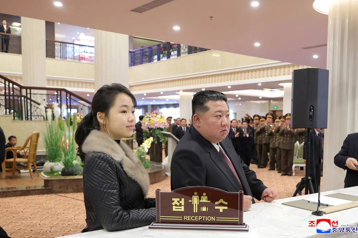 North Korea's Kim Jong Un tours hotels with daughter, lauds economic progress