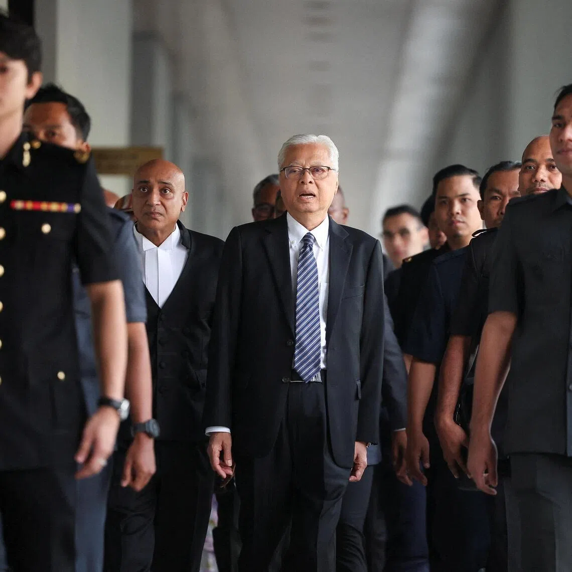 Malaysia’s former prime minister Datuk Seri Ismail Sabri Yaakob arrives at the Kuala Lumpur court complex on Aug 27.