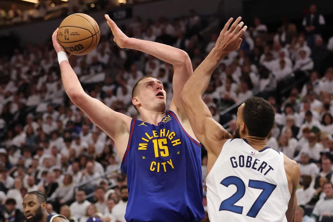 Nikola Jokic of the Denver Nuggets takes a shot over Rudy Gobert of the Minnesota Timberwolves in the second half of Game 3 of their NBA play-offs.