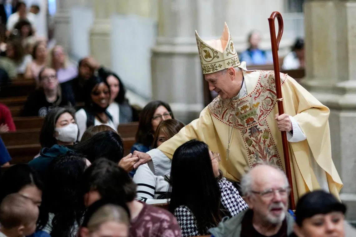 Archbishop Gabriele Caccia, permanent observer of the Holy See to the United Nations, greets parishioners before Mass for the late Pope Francis, at St. Patrick's Cathedral in New York City, U.S., April 26, 2025. REUTERS/Eduardo Munoz/File Photo