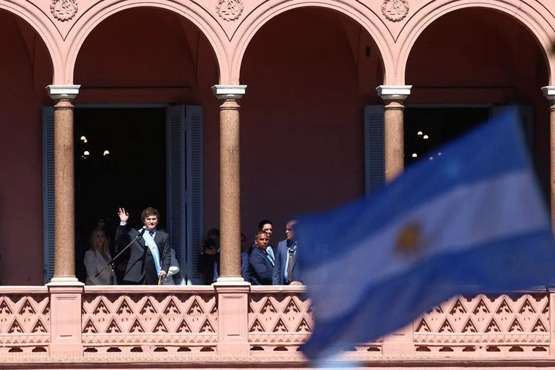 Argentina's President Javier Milei addresses supporters gathered outside Casa Rosada after his swearing-in ceremony, in Buenos Aires, Argentina December 10, 2023. REUTERS/Matias Baglietto/File Photo