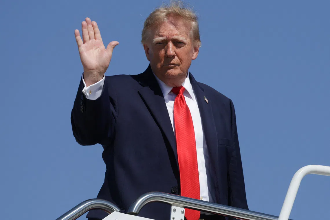 US President Donald Trump waves while boarding Air Force One, as he travels to Texas and Oklahoma, at Joint Base Andrews, Maryland, US, October 1, 2026. REUTERS/Jonathan Ernst