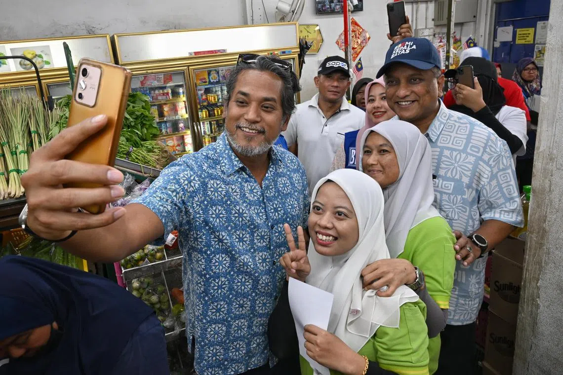 Khairy Jamaluddin, Former Minister of Health of Malaysia, joining (wearing cap) Reezal Merican, Barisan Nasional's Bertam Candidate during a walkabout in Kepala Batas on Aug 10, 2023.



/Malaysia State Elections 2023.