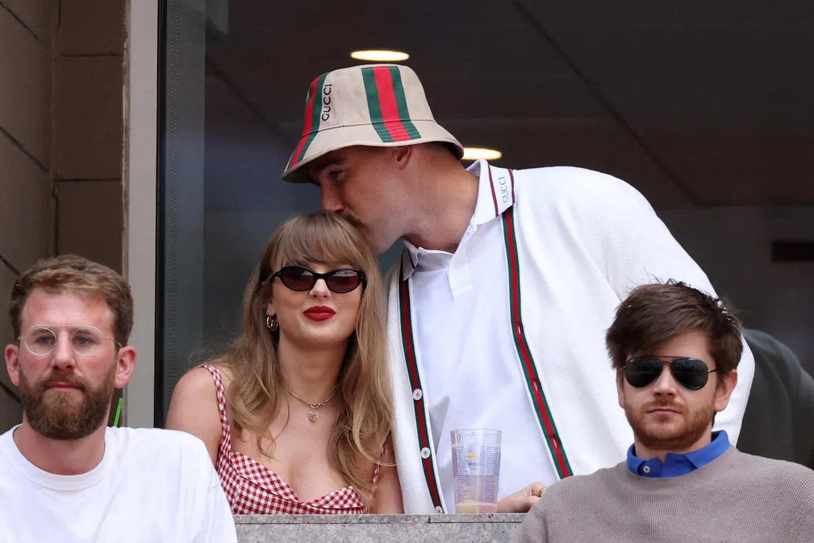 FILE PHOTO: Tennis - U.S. Open - Flushing Meadows, New York, United States - September 8, 2024 Singer Taylor Swift and Kansas City Chiefs' Travis Kelce are seen ahead of the final match between Italy's Jannik Sinner and Taylor Fritz of the U.S. REUTERS/Mike Segar/File Photo