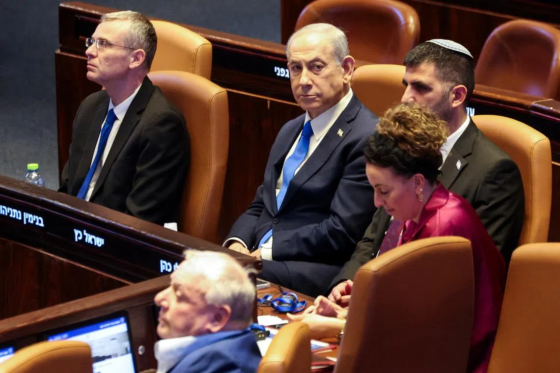 Israeli Prime Minister Benjamin Netanyahu attends a session of the Knesset, Israel's parliament, in Jerusalem, January 26, 2026. REUTERS/Ronen Zvulun