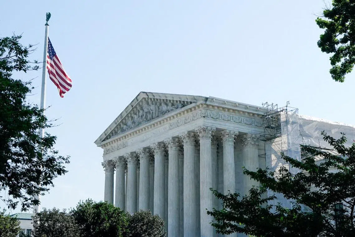 FILE PHOTO: The U.S. Supreme Court building is seen the morning before justices are expected to issue opinions in pending cases, in Washington, U.S., June 14, 2024. REUTERS/Elizabeth Frantz/File Photo