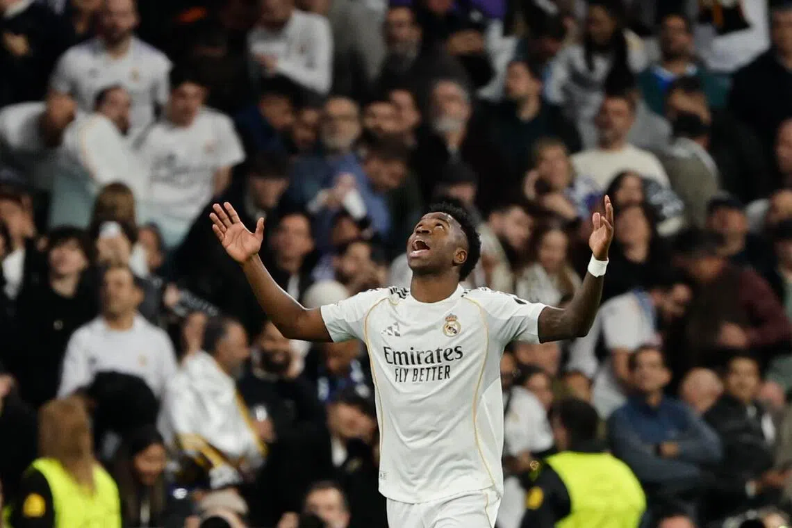 Real Madrid's Vinicius Junior celebrates after scoring the winning goal against Benfica on Feb 25.