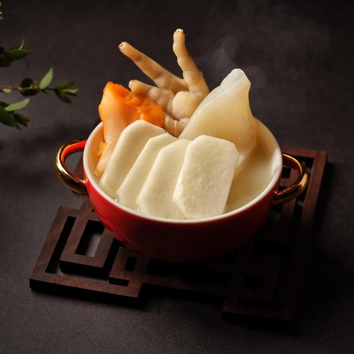 Shang Palace’s Double-boiled An Xin Chicken Broth With Fish Maw, Sea Conch And Honeydew. 


