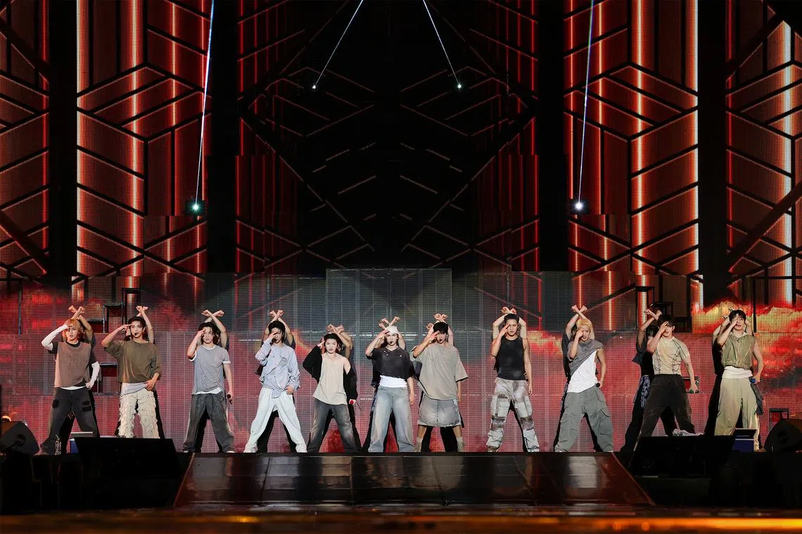 K-pop boy band Seventeen (from left: Seungkwan, Joshua, Dino, The8, Woozi, Vernon, DK, Mingyu, Hoshi, S.Coups and Wonwoo) played to a sold out crowd at the National Stadium in Singapore on Jan 25, 2025.