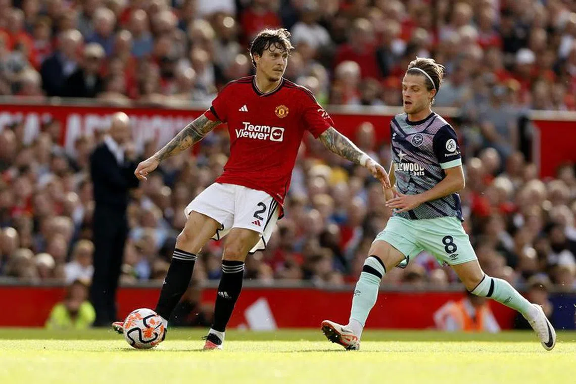 Soccer Football - Premier League - Manchester United v Brentford - Old Trafford, Manchester, Britain - October 7, 2023 Manchester United's Victor Lindelof in action with Brentford's Mathias Jensen Action Images via Reuters/Jason/File Photo