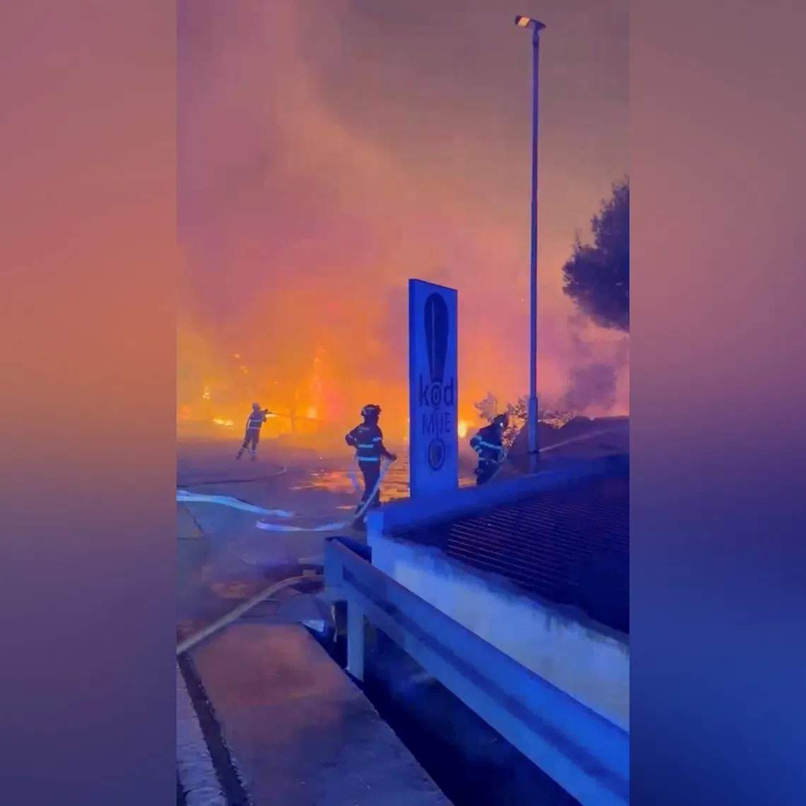 Firefighters work to extinguish a wildfire in Omis, Croatia, on Aug 13.