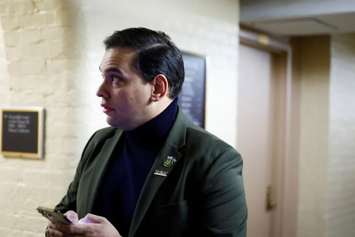 U.S. Representative George Santos (R-NY) walks to a House Republican Conference meeting as Republicans work towards electing a new Speaker of the House on Capitol Hill in Washington, U.S., October 9, 2023. REUTERS/Evelyn Hockstein