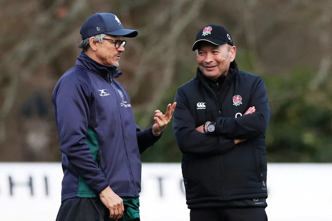FILE PHOTO: Rugby Union - Six Nations Championship - England Training - Pennyhill Park Hotel, Bagshot, Britain - February 20, 2019   England head coach Eddie Jones with London Irish head coach Les Kiss during training   Action Images via Reuters/Peter Cziborra/File Photo