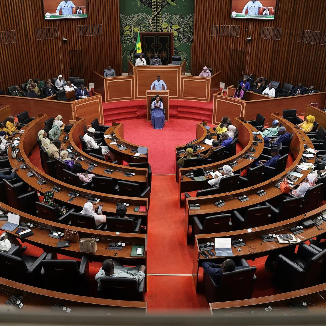 Senegalese lawmakers participate in a debate on a new bill that would double the maximum penalty for same-sex sexual acts to 10 years and criminalize the promotion of homosexuality, in Dakar, Senegal, March 11, 2026. REUTERS/Zohra Bensemra