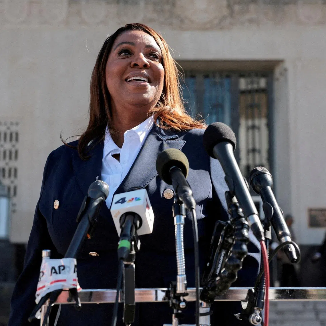 FILE PHOTO: New York Attorney General Letitia James speaks to the media outside the U.S. District Court for the Eastern District of Virginia, in Norfolk, Virginia, U.S., October 24, 2025. REUTERS/Jonathan Ernst/File Photo