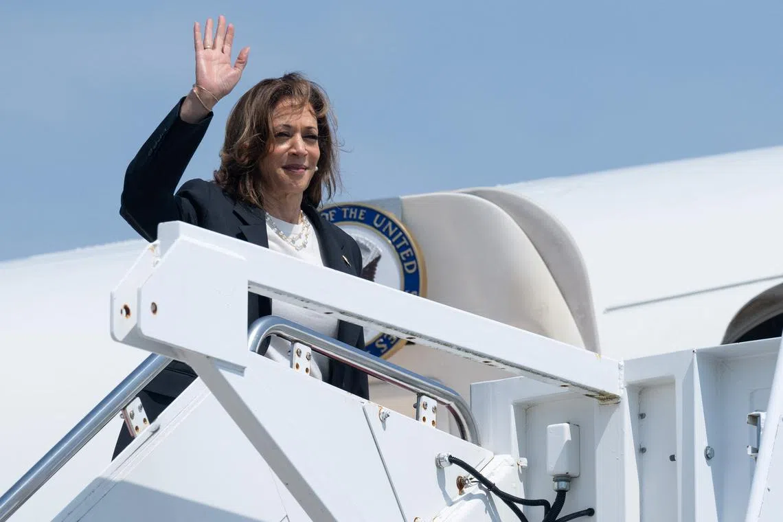 U.S. Vice President Kamala Harris waves as she boards Air Force Two to depart from Joint Base Andrews in Maryland, August 28, 2024, as she travels to Savannah, Georgia for a 2-day campaign bus tour. SAUL LOEB/Pool via REUTERS