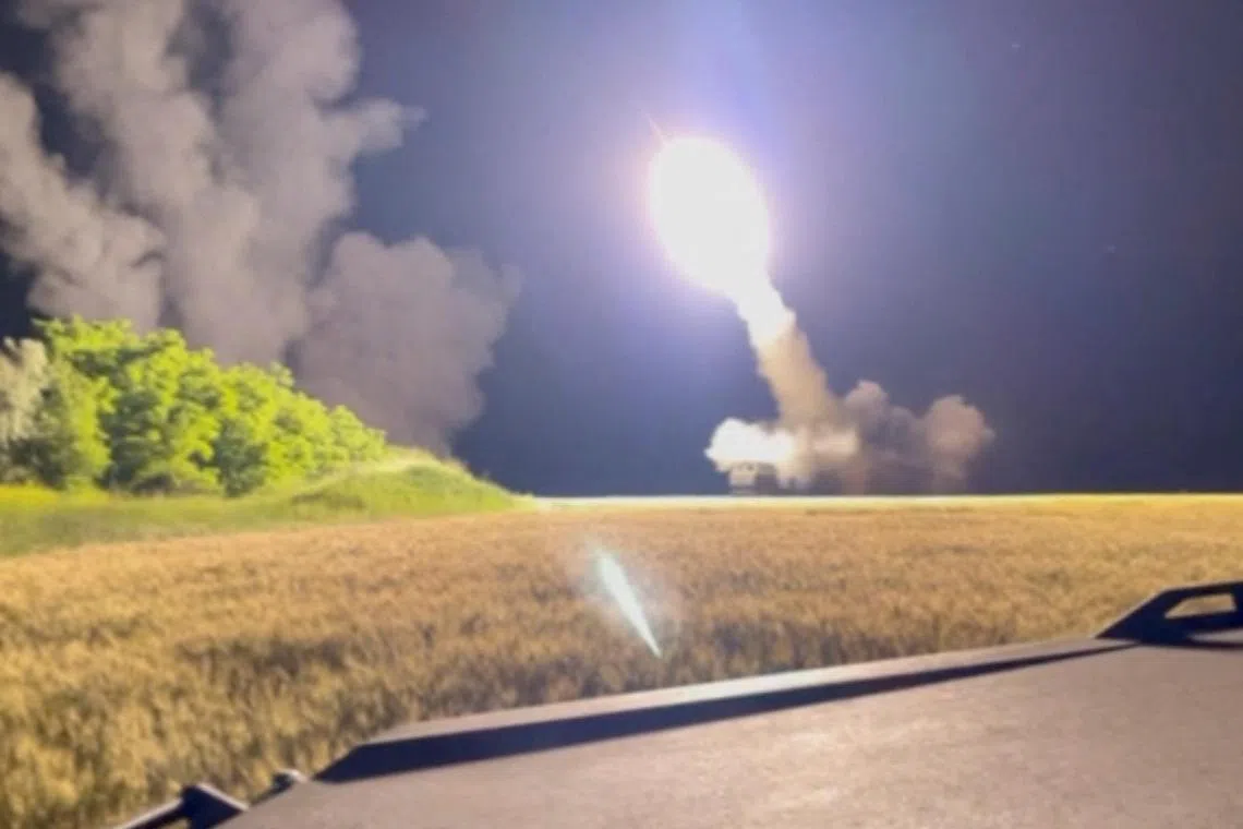 A view shows a M142 High Mobility Artillery Rocket System (HIMARS) is being fired in an undisclosed location, in Ukraine in this still image obtained from an undated social media video uploaded on June 24, 2022 via Pavlo Narozhnyy/via REUTERS  THIS IMAGE HAS BEEN SUPPLIED BY A THIRD PARTY. MANDATORY CREDIT. NO RESALES. NO ARCHIVES. REUTERS WAS NOT ABLE TO VERIFY THE LOCATION OR DATE THE VIDEO WAS FILMED. THE VIDEO SHOWS THE FIRING OF WHAT PURPORTS TO BE A HIGH MOBILITY ARTILLERY ROCKET SYSTEM (HIMARS). THE SHAPE OF THE WEAPON MATCHES FILE IMAGES OF THE ROCKET SYSTEM.
 