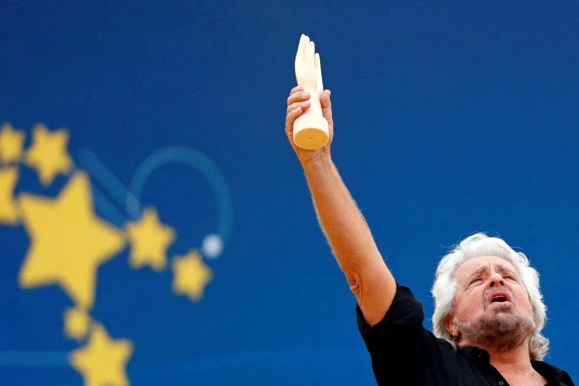 Founder Beppe Grillo speaks at the 5-Star Movement party's open-air rally at Circo Massimo in Rome, Italy, October 21, 2018. REUTERS/Max Rossi/File Photo