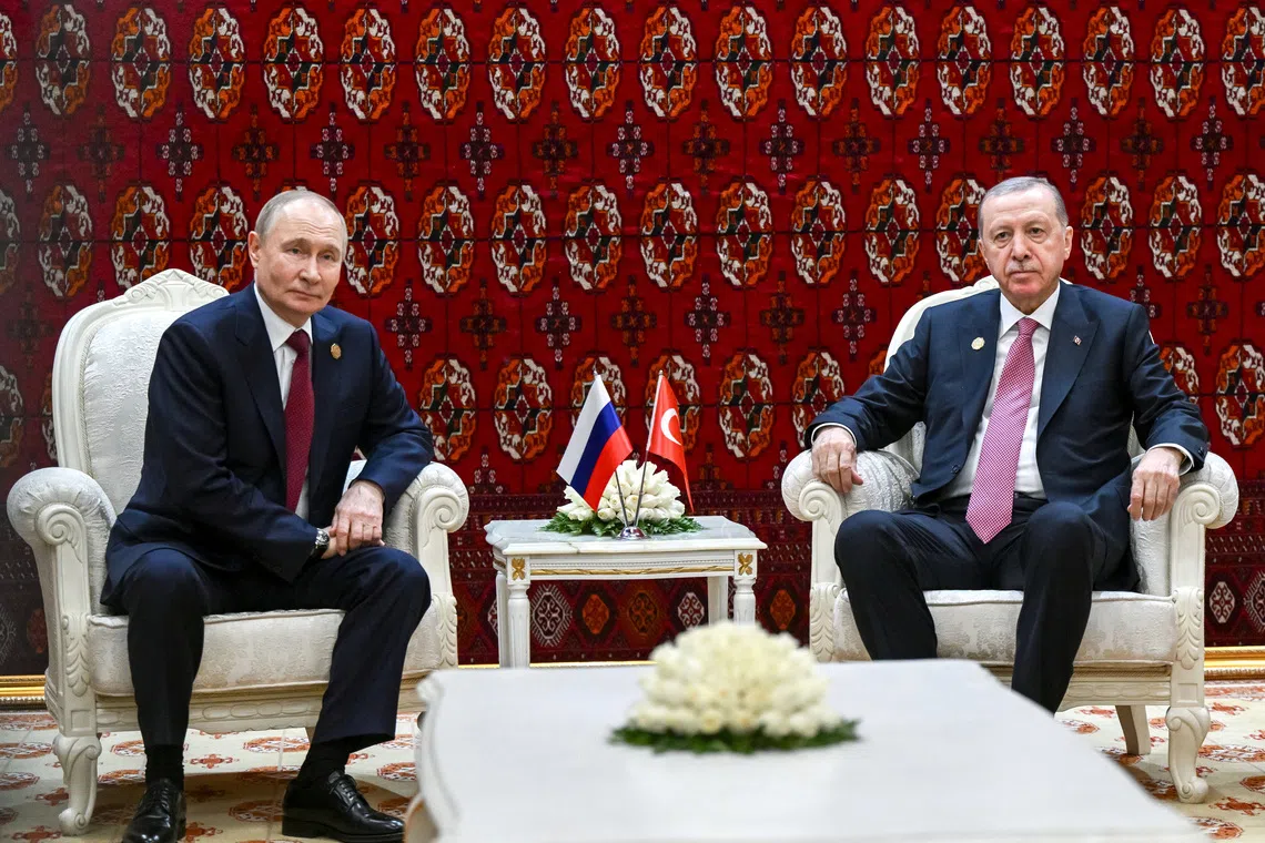 Russian President Vladimir Putin and Turkish President Tayyip Erdogan attend a meeting in Ashgabat, Turkmenistan December 12, 2025. Sputnik/Kristina Kormilitsyna/Pool via REUTERS