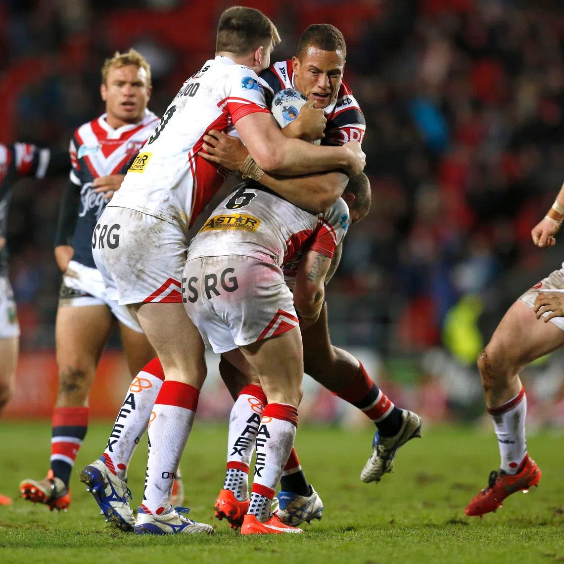 Rugby League - St Helens v Sydney Roosters - 2016 Dacia World Club Series - Langtree Park - 19/2/16 Kane Evans of Sydney Roosters (C) in action. Mandatory Credit: Action Images / Ed Sykes Livepic