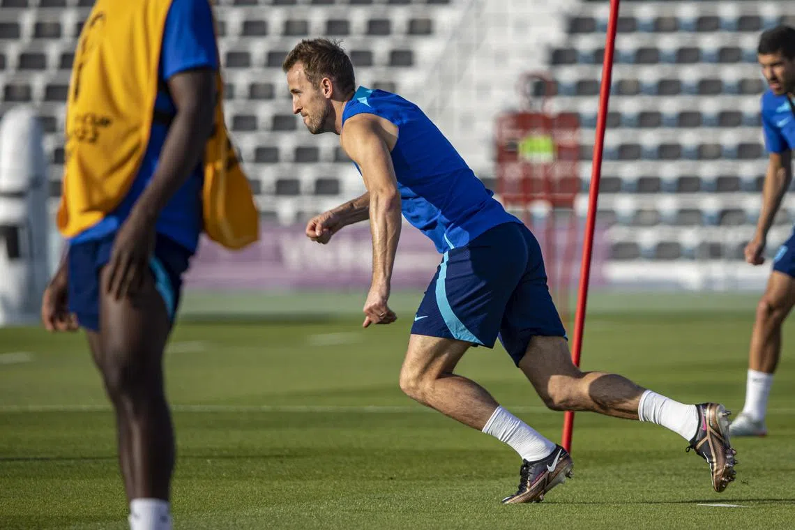 England captain Harry Kane in action during a training session in Doha on Monday. Three Lions manager Gareth Southgate says the striker is fit to face Wales in their World Cup Group B match on Tuesday.