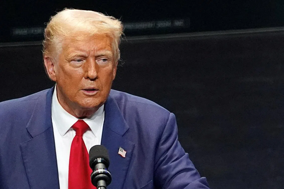 FILE PHOTO: Republican presidential nominee and former U.S. President Donald Trump makes a campaign speech at the Johnny Mercer Theatre Civic Center in Savannah, Georgia, U.S. September 24, 2024. REUTERS/Megan Varner/File Photo