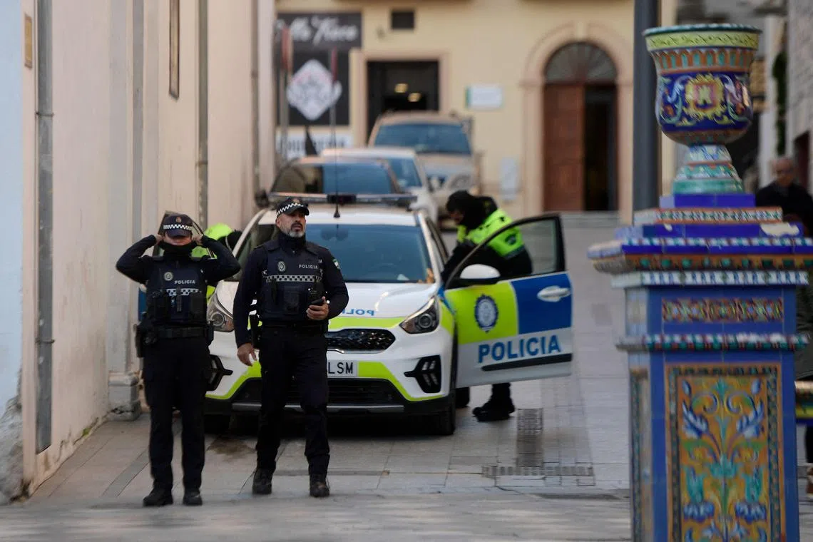 Police secure the area near the church where a man was killed the day before in Algeciras, southern Spain, on Jan 26, 2023.