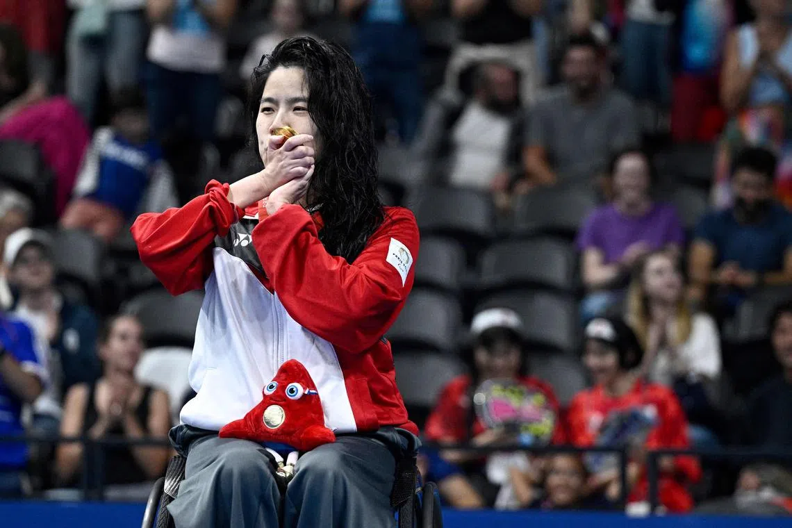 Singapore gold medallist Yip Pin Xiu celebrating her win in the S2 50m backstroke on the podium, on Aug 31.