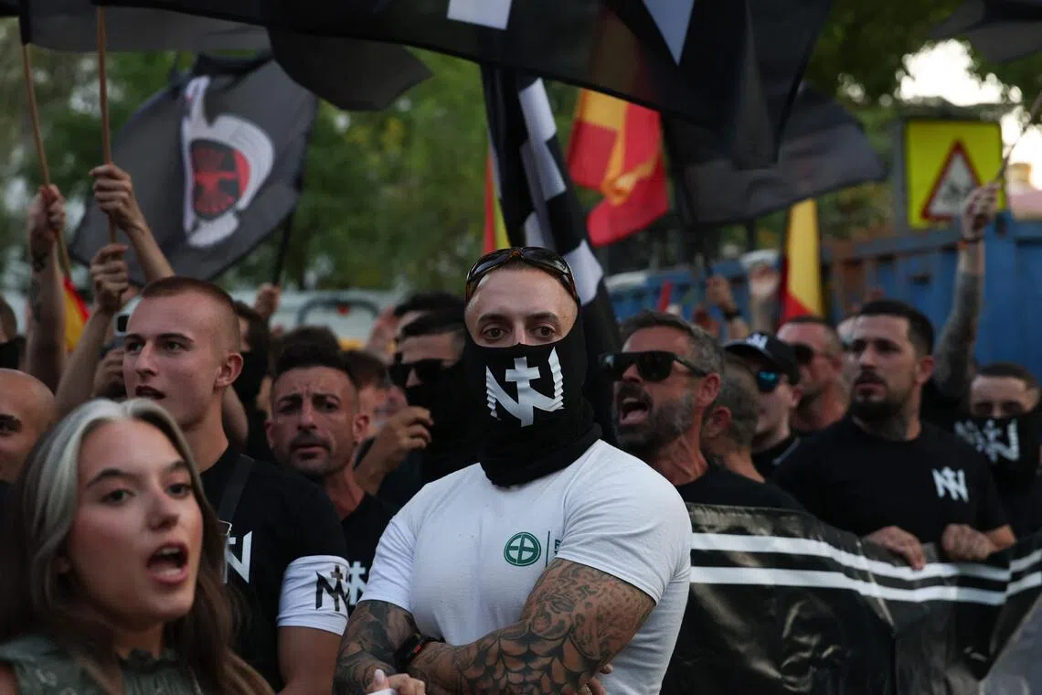 Far-right demonstrators protest against the mass arrival of Moroccan migrants in Ceuta, in Madrid on July 31.