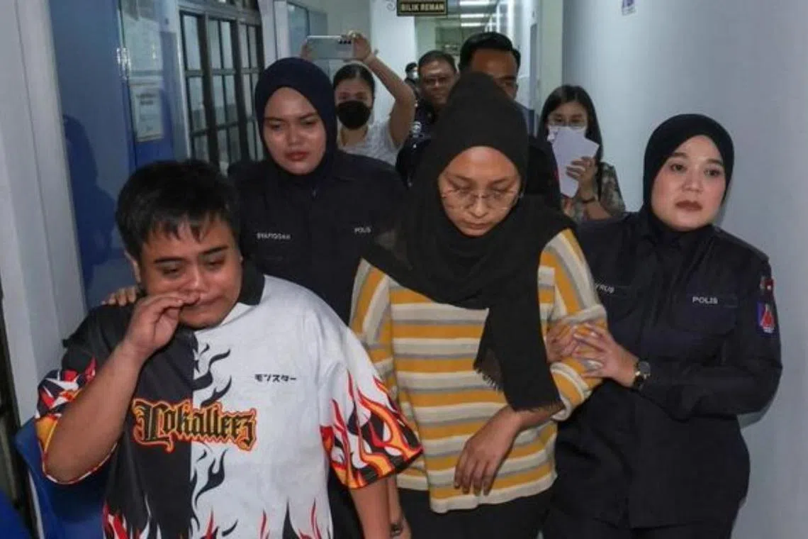 The boy's mother Nurul Asyiqin Mohamad Zahir (centre) and her housemate Awiin Chua changed their pleas to guilty after the charges against them were read again on Sept 27.