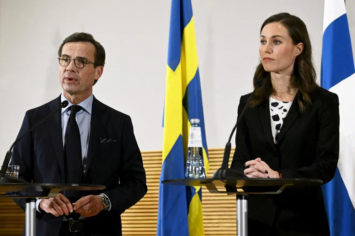 Swedish PM Ulf Kristersson (left) and Finnish counterpart Sanna Marin attend a news conference in Helsinki, on Nov 1, 2022.
