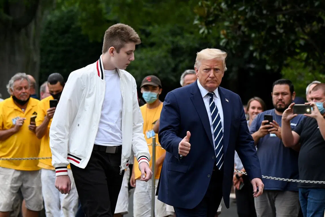 Donald Trump's youngest son, Barron Trump (left), will not be one of the delegates representing Florida at the Republican National Convention in July. 