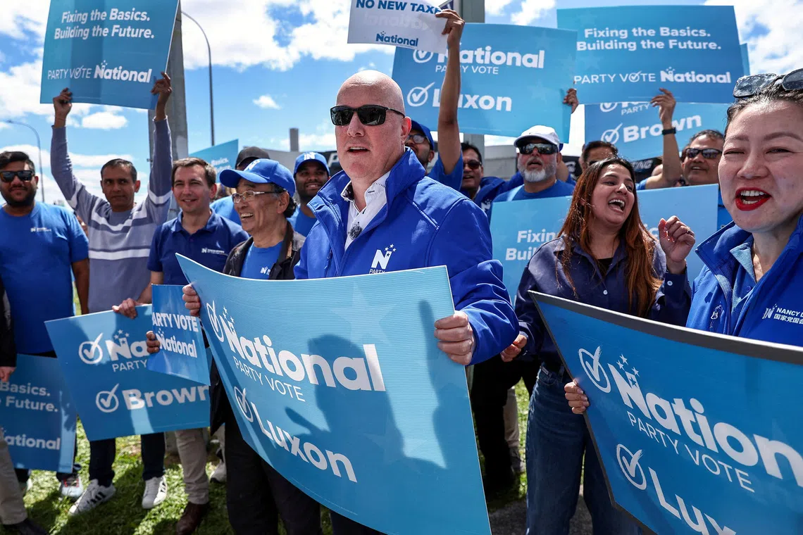 New Zealand’s Prime Minister and National Party leader Christopher Luxon campaigns in his Botany electorate in Auckland, on Oct 26.