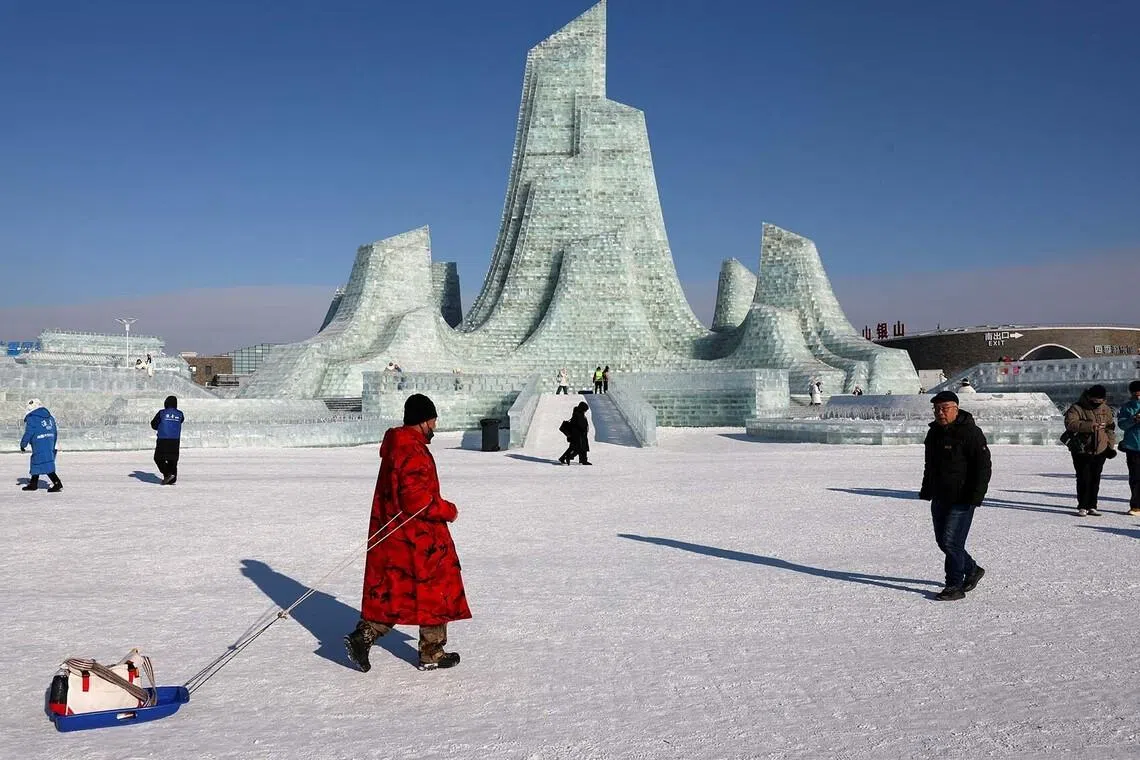 People visit the annual Ice and Snow Festival in Harbin, Heilongjiang Province, China, January 4, 2026. REUTERS/Go Nakamura