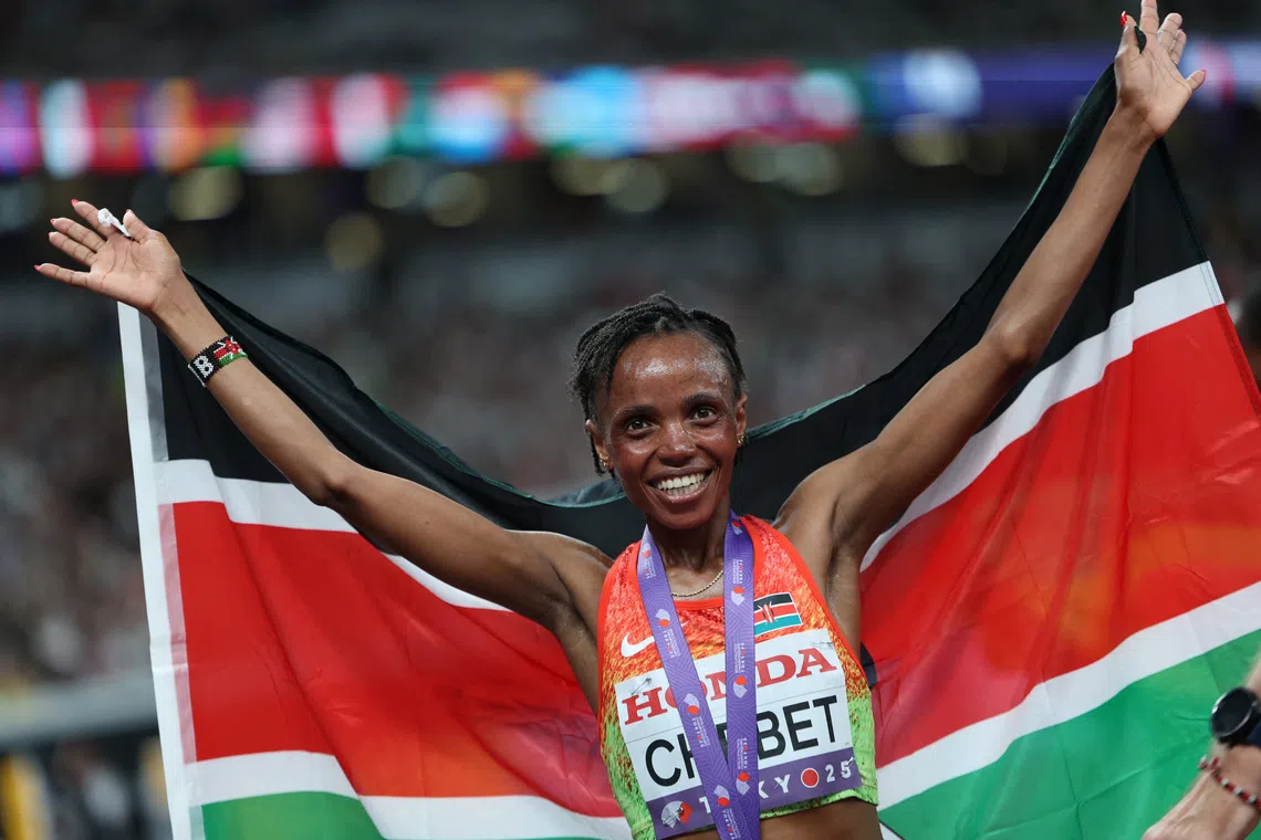 World Athletics Championships Tokyo 2025 - Women's 10,000m Final - Japan National Stadium, Tokyo, Japan - September 13, 2025  Kenya's Beatrice Chebet celebrates winning the women's 10,000m final REUTERS/Eloisa Lopez