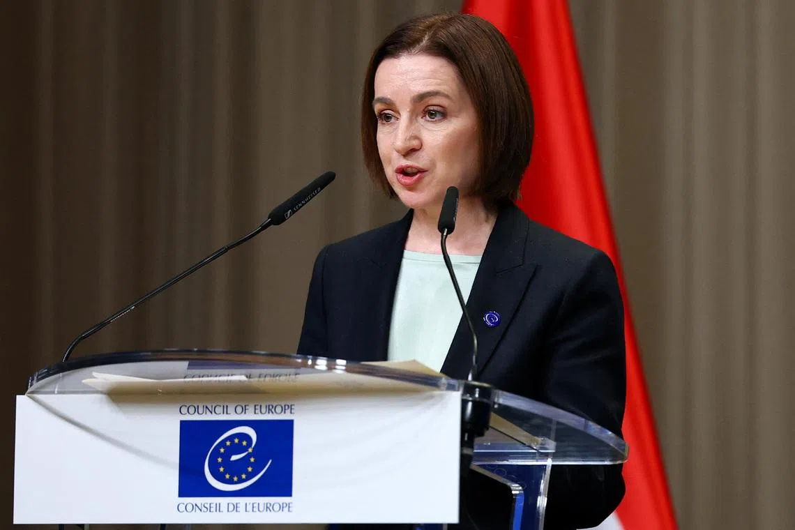 Moldovan President Maia Sandu speaks during a Council of Europe diplomatic conference to launch the International Claims Commission for Ukraine, aimed at handling compensation claims related to Russia's war in Ukraine, in The Hague, Netherlands, December 16, 2025. REUTERS/Piroschka van de Wouw
