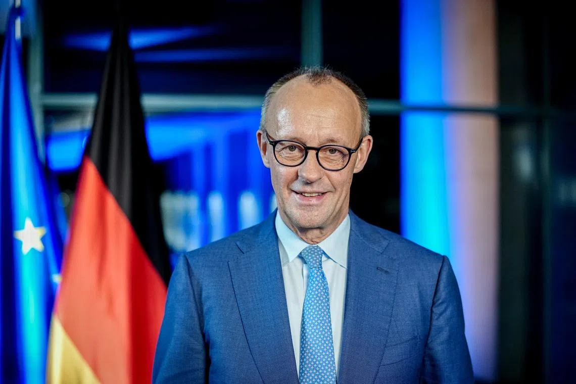 German Chancellor Friedrich Merz poses before the recording of his New Year's speech at the Chancellery in Berlin, Germany, December 19, 2025.   Kay Nietfeld/Pool via REUTERS